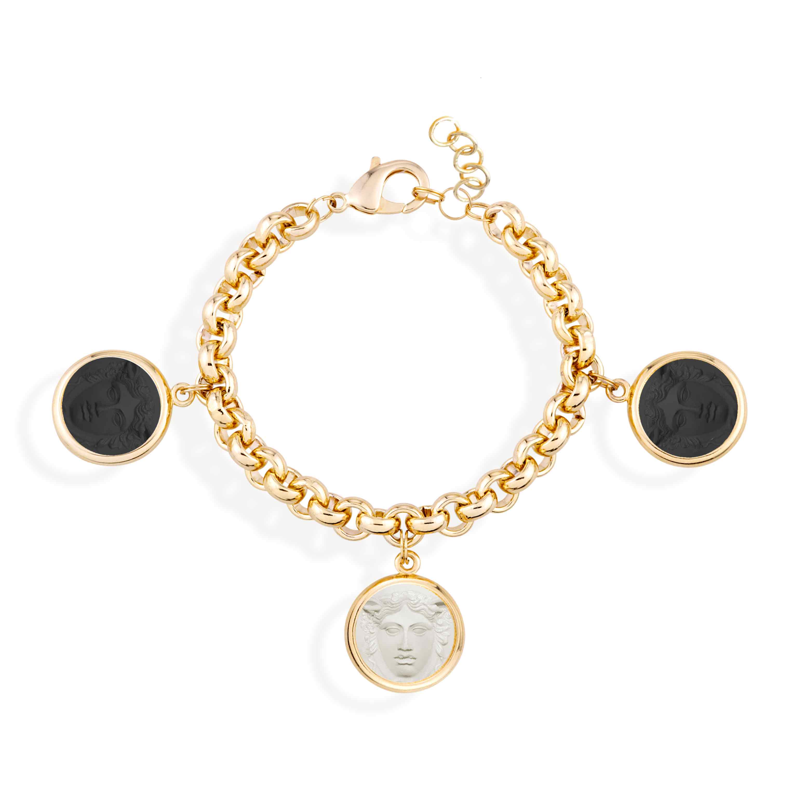 Gold chain bracelet with black and white disc charms on a white background